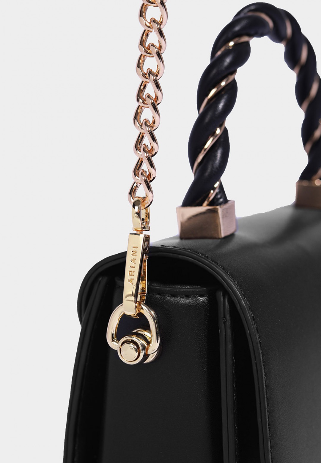 TWISTED TOP HANDLE BAG