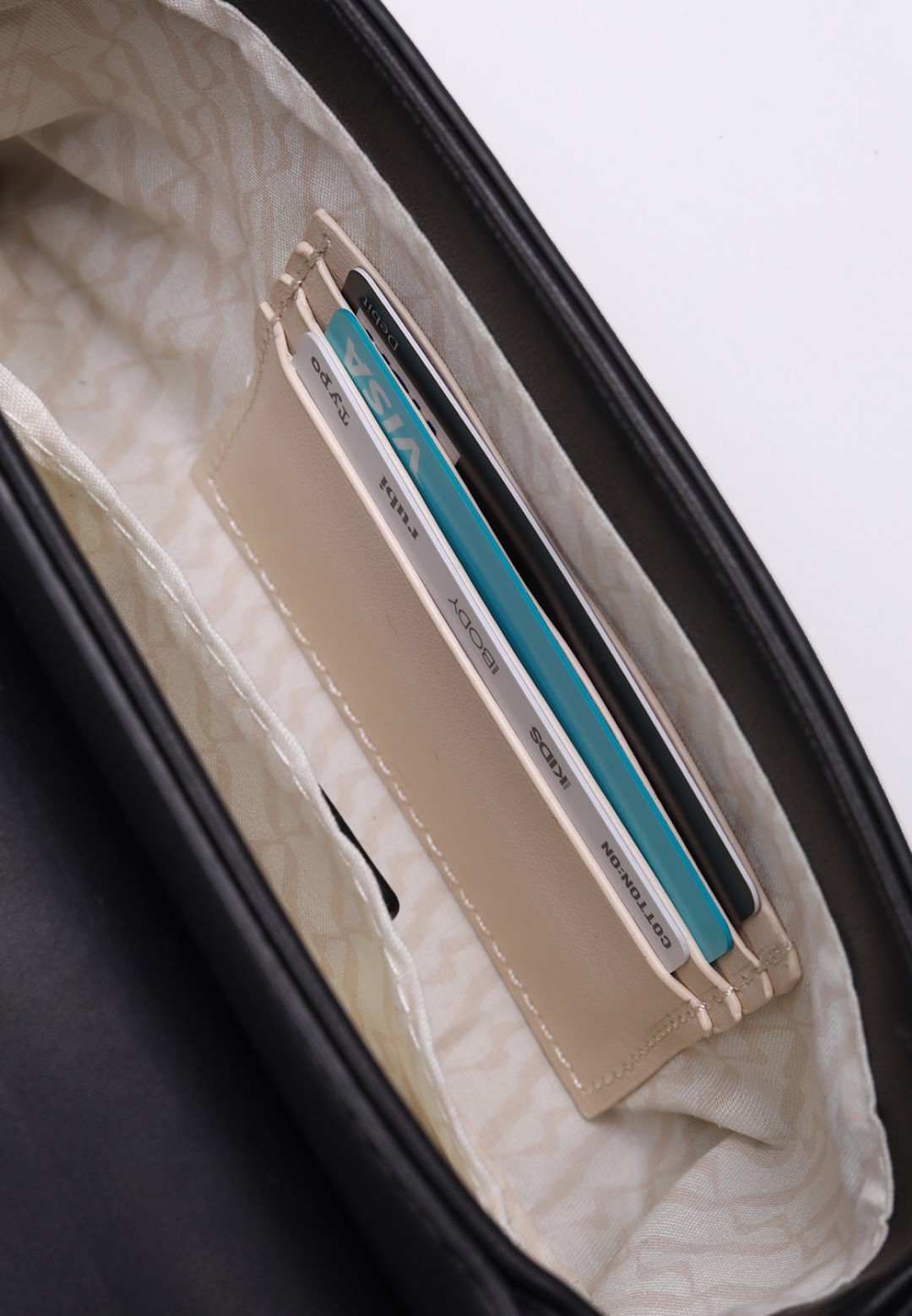 TWISTED TOP HANDLE BAG